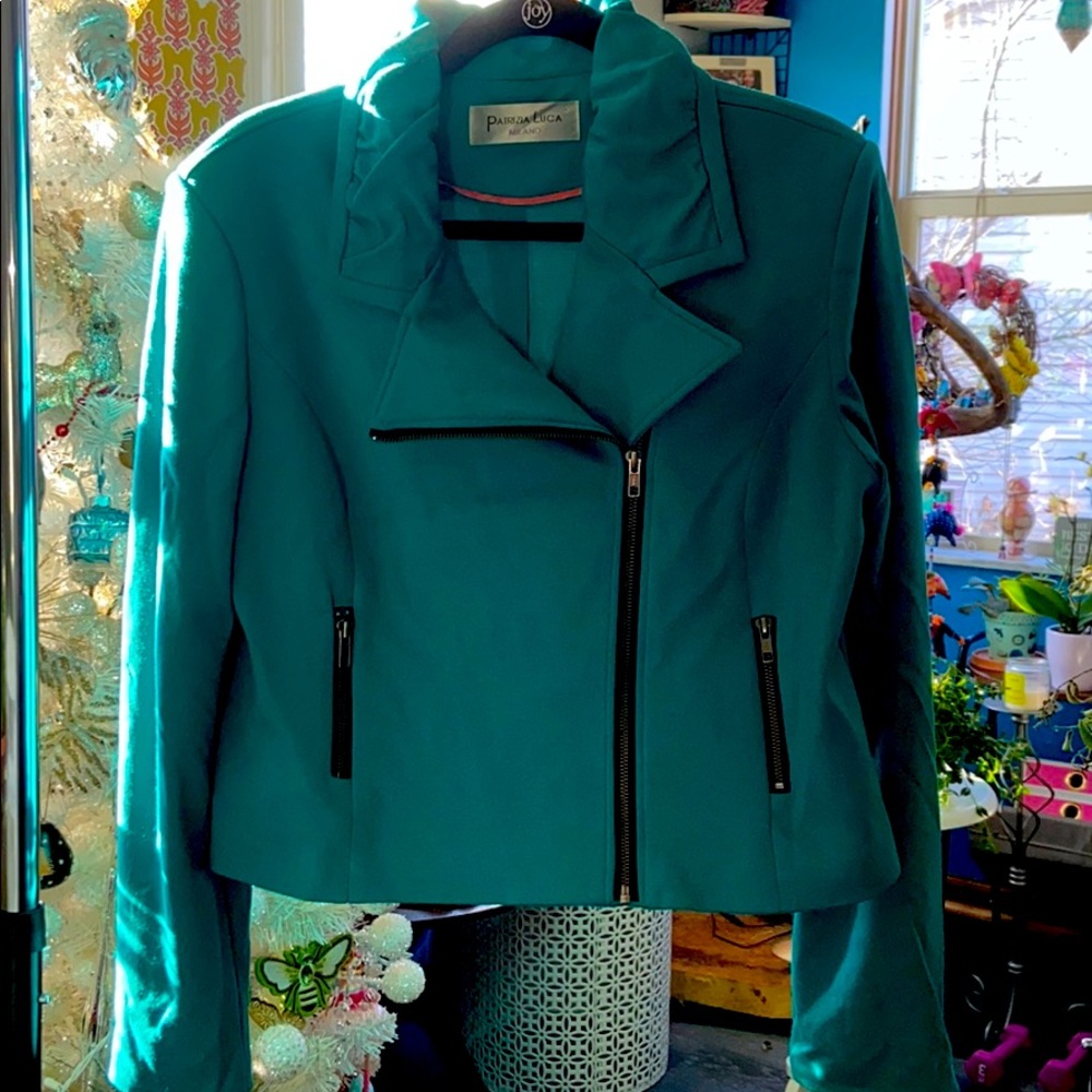Cropped teal motorcycle jacket zipper detail